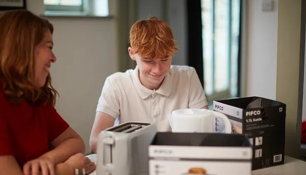 Young person in care with their carer