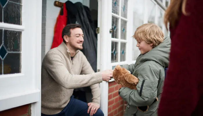 Child meeting foster carer for the first time