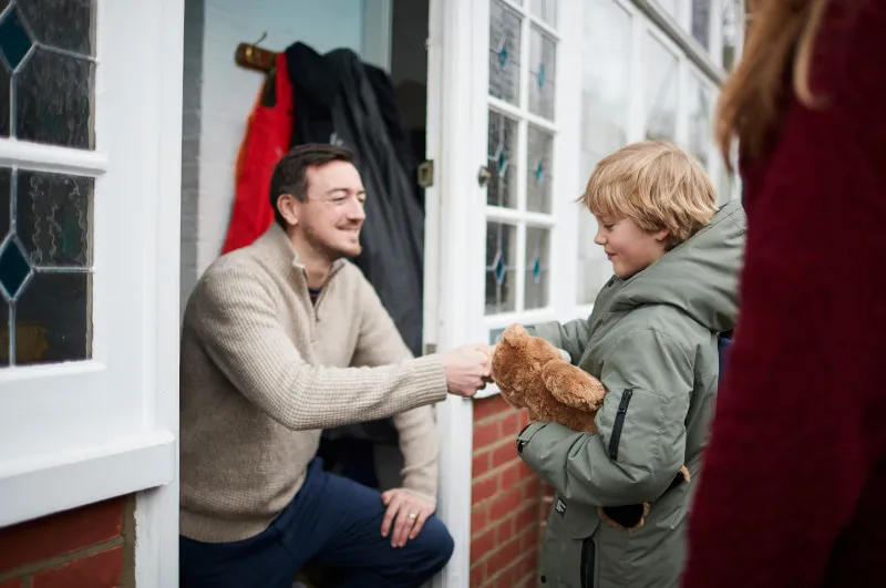 Child meeting foster carer for the first time