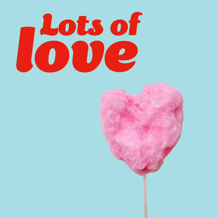 Lot's of love eCard with heart candyfloss on blue background