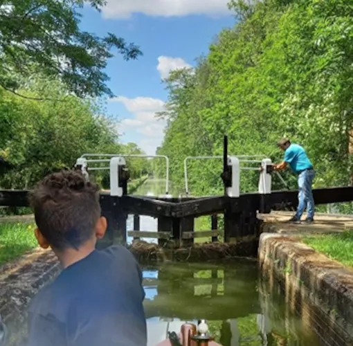 Boys on a canal boat with the Bucks Activity Project
