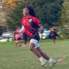 Chan playing rugby
