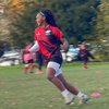 Chan playing rugby