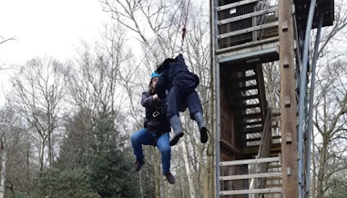 Child and helper climbing at the Bucks Activity Project