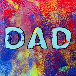 Children's painting with blue Dad text on it