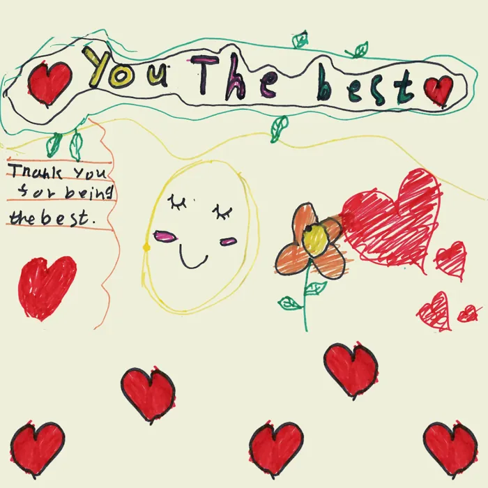 Children's drawing of smiley face, hearts and flowers with you the best writing