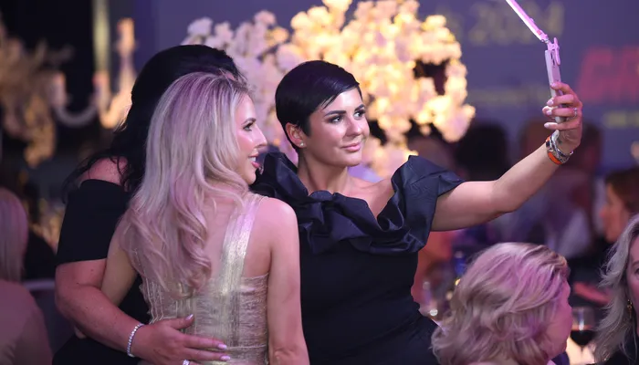 Three women taking a selfie at the Women of Influence Awards