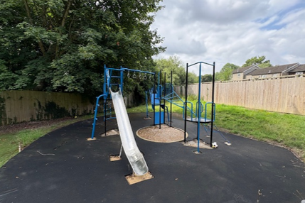 Climbing frame with slide
