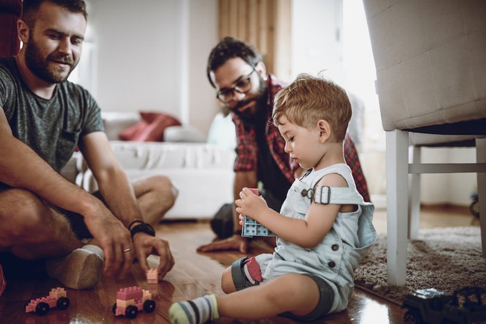 Gay fathers with child