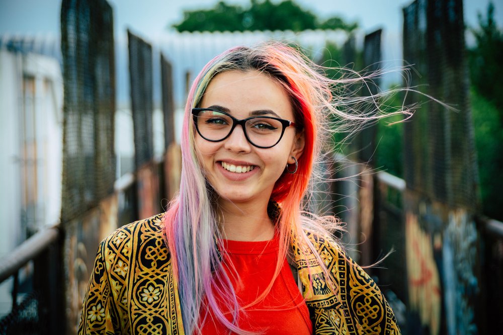 Happy teenager with colourful hair