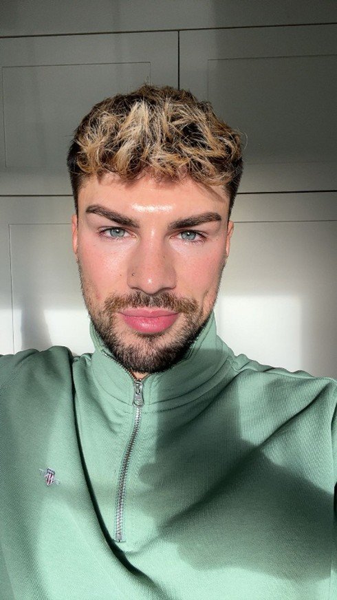 A picture of Youth Ambassador, Joel. He is looking at the camera.