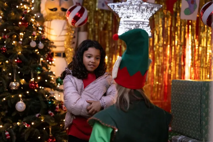 Lily and Anna Maxwell-Martin as a Christmas Grotto Elf in Santaland video