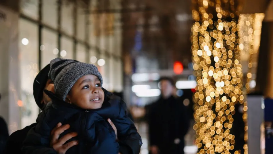 Little boy enjoying the Christmas lights