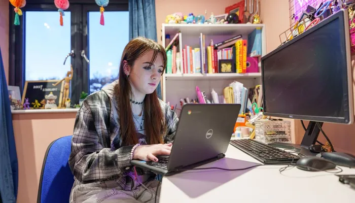 Meghan using her Dell Technology Laptop