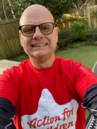 Niaill Whatmore in his Action for Children t-shirt