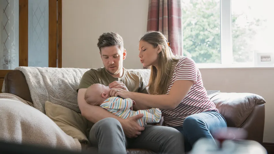 Parents with newborn baby