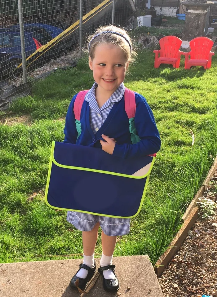 Phoebe Kelly in school uniform