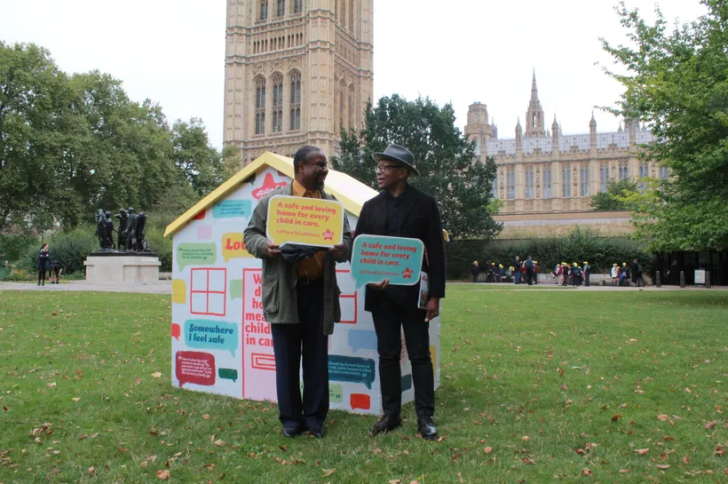 Ronnie Archer Morgan (right) and Godfrey (left) standing outside the Houses of Parliment