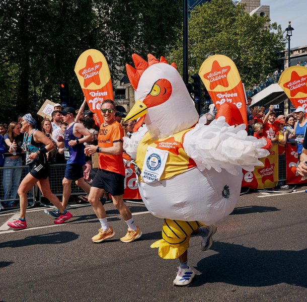 Sebastian Burley running in an inflatable chicken costume at the London Marathon 2026