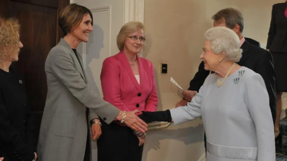 The Queen greeting Action for Children staff