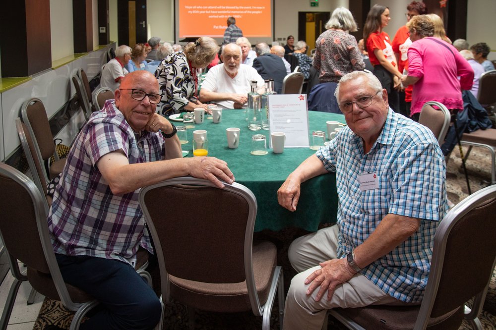 Two friends at AFC reunion event 2023