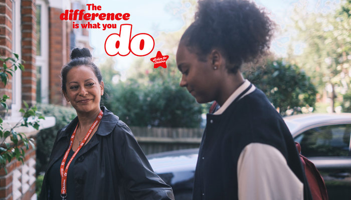 Young girl approaches new foster home with support worker, acted by Chan, one of Action for Children's young ambassadors