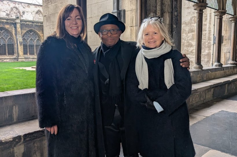 Ronnie Archer-Morgan with Action for Children workers at the Royal Carol concert 2025