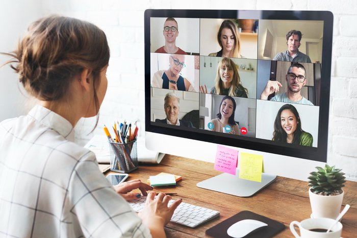 Woman in a video conference call in her home office