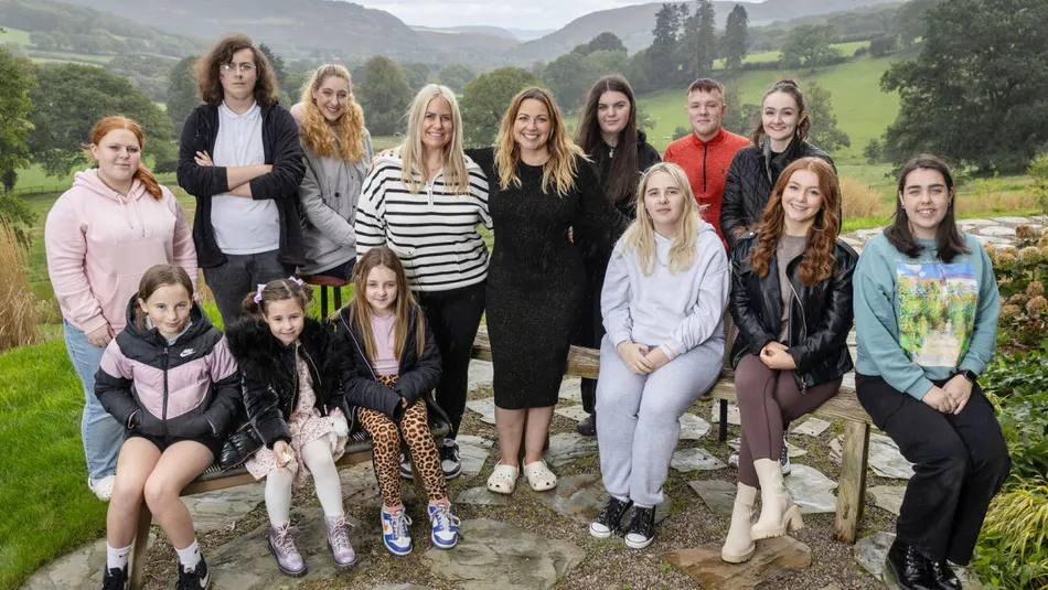 Young Carers Aloud choir with Charlotte Church sitting outside