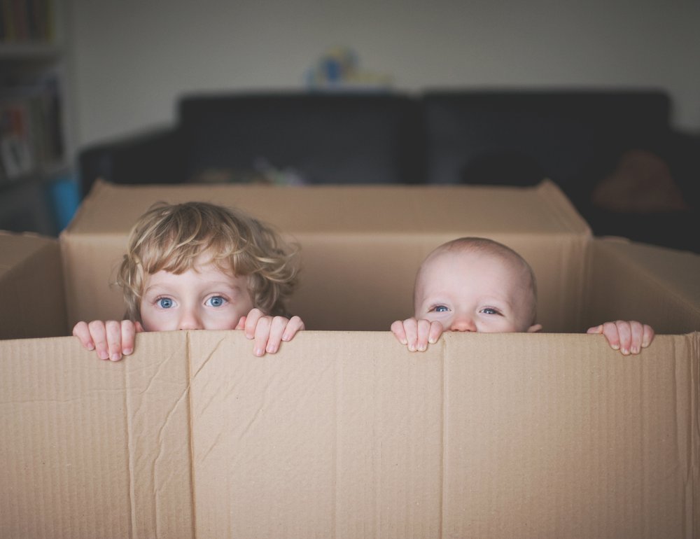 Young boys playing in box