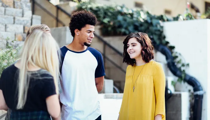 Teenagers talking together