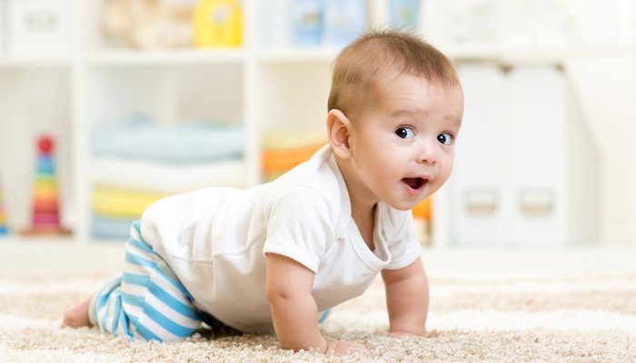 crawling baby boy indoors 2