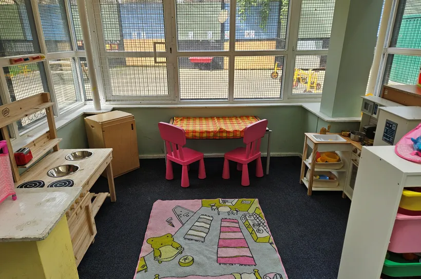 Creative area of the home corner with colourful rug